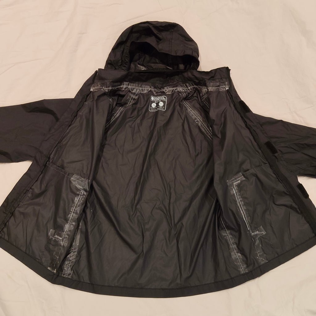 MOUTAIN WAREHOUSE rain jacket size 9-10y unisex kids black