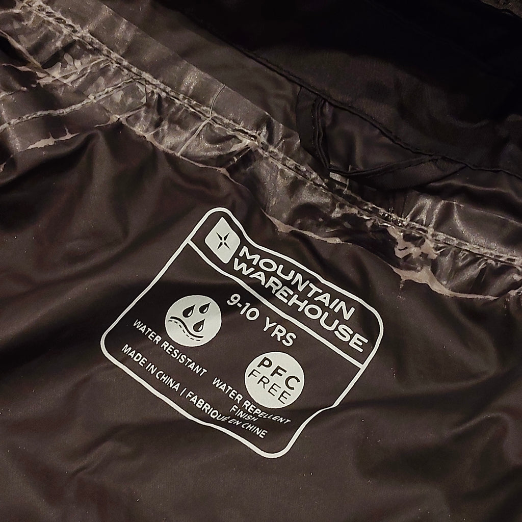 MOUTAIN WAREHOUSE rain jacket size 9-10y unisex kids black