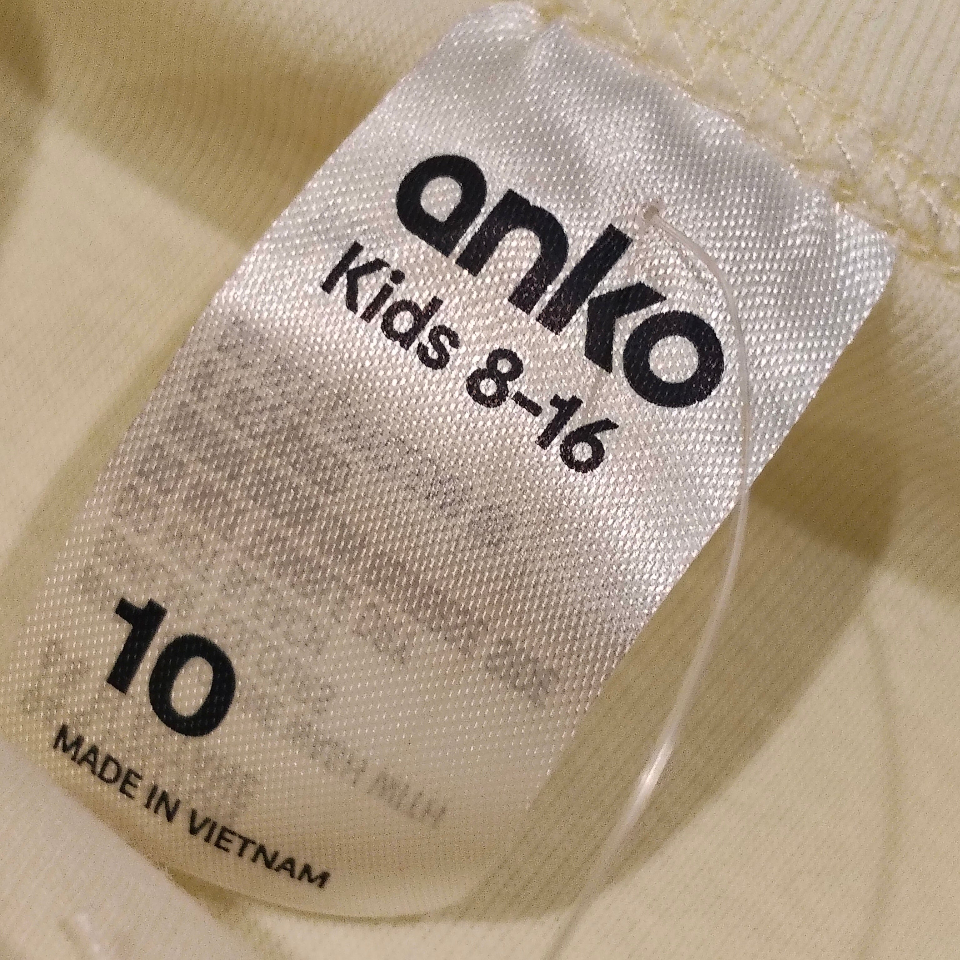 New top size 10yrs girls light yellow sleeveless