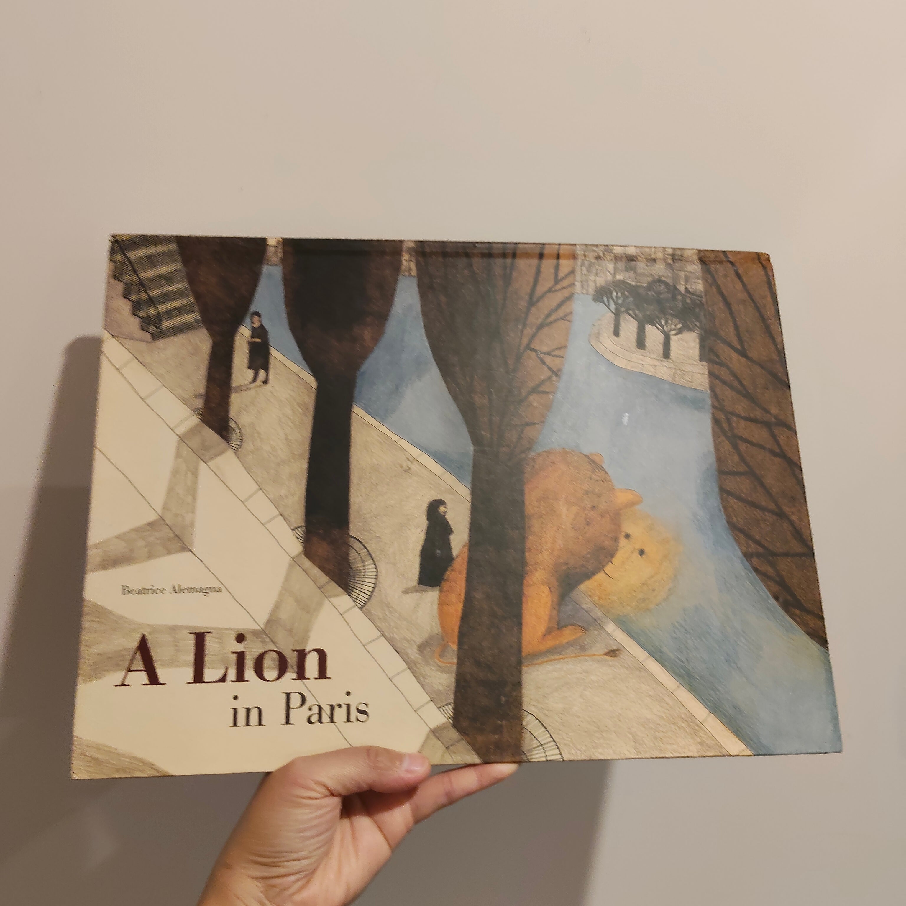 A Lion in Paris by Beatrice Alemagna Hardcover Book Large