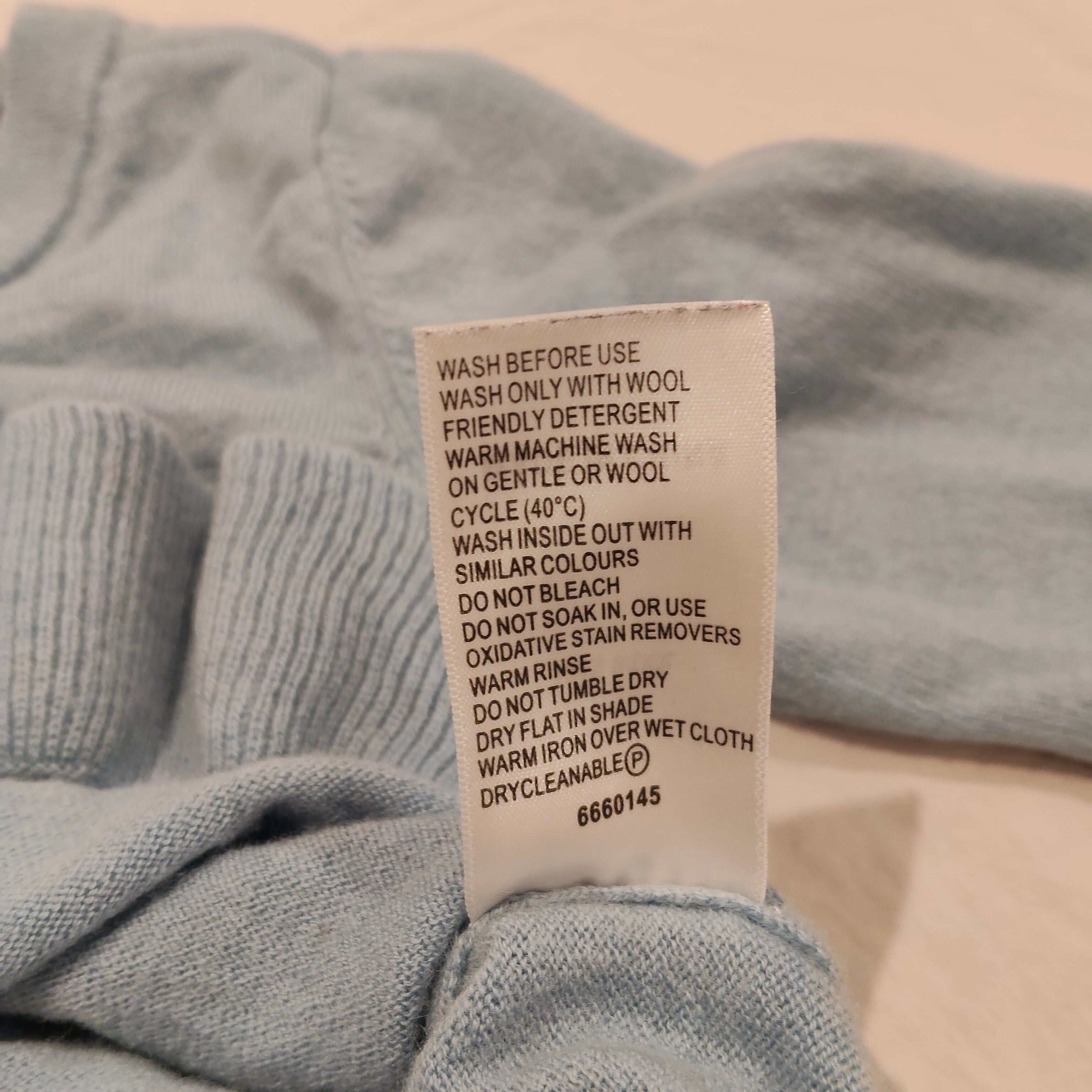 NORTH SOUTH 100% Merino top size 7yrs girls light blue