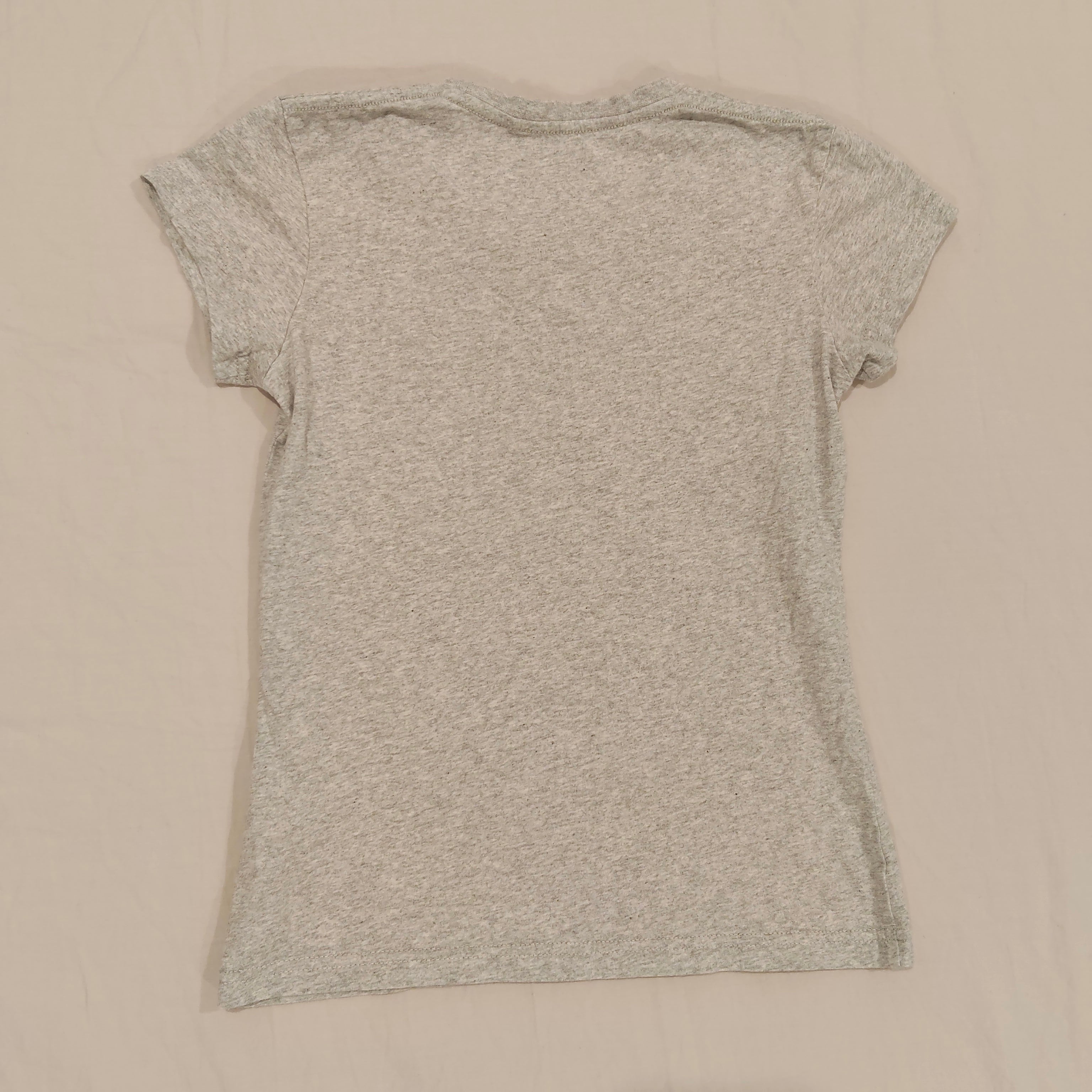 KATHMANDU top size 10yrs girls short sleeve "Travelling With You"