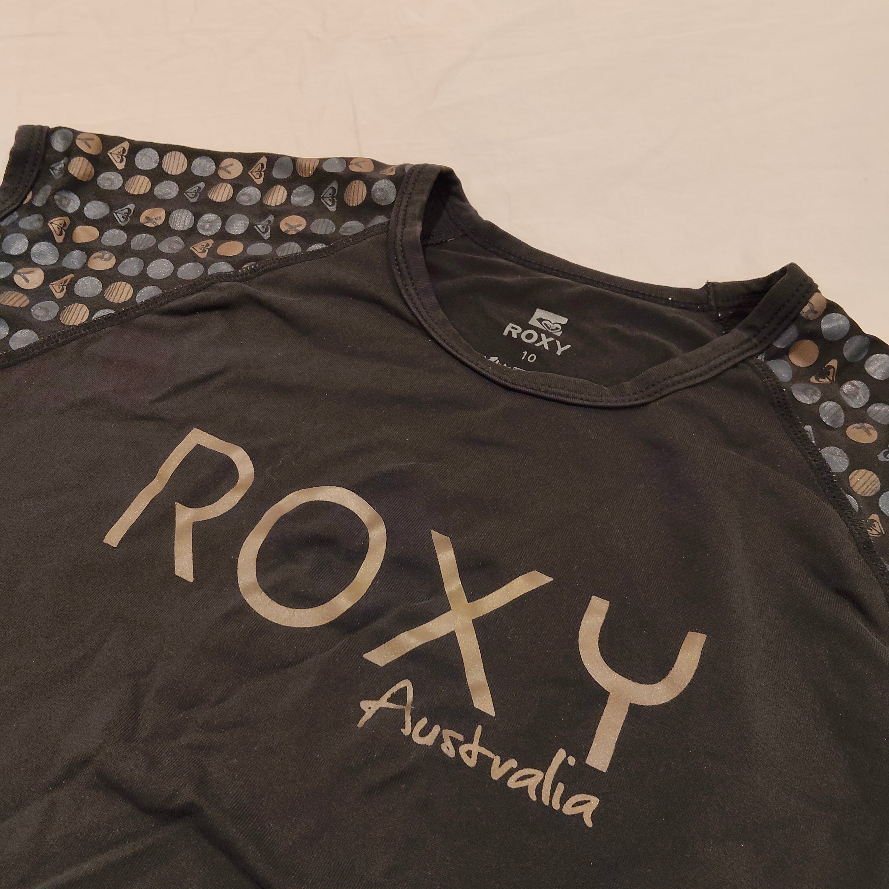 ROXY cap sleeve rash top size 10 Womens swimwear