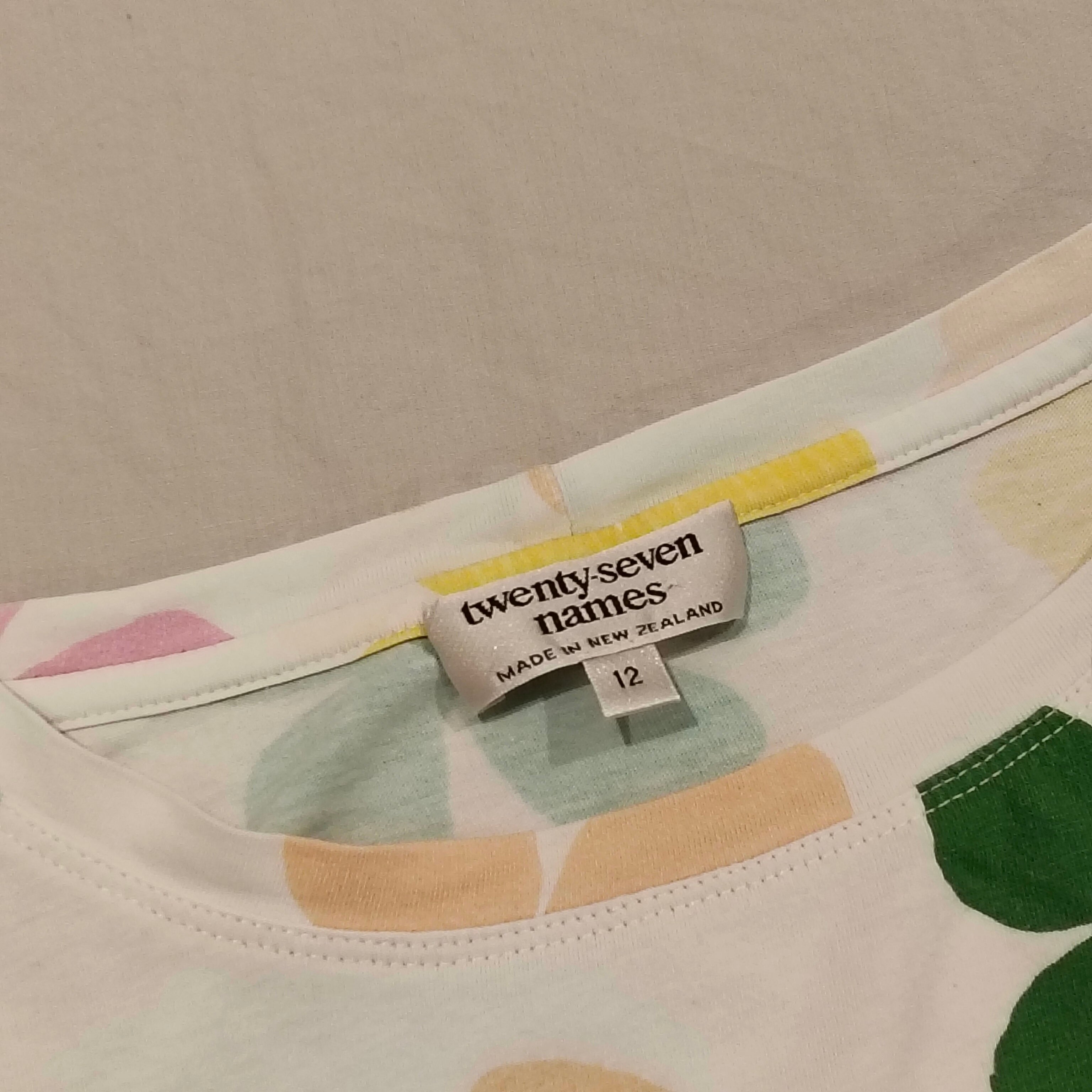TWENTY-SEVEN NAMES oversized tee size 12 Womens Oop-a-Daisy