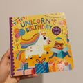 "Unicorn's Birthday: Turn the Wheels for Some Silly Fun!" written by Lucy Golden BOARDBOOK