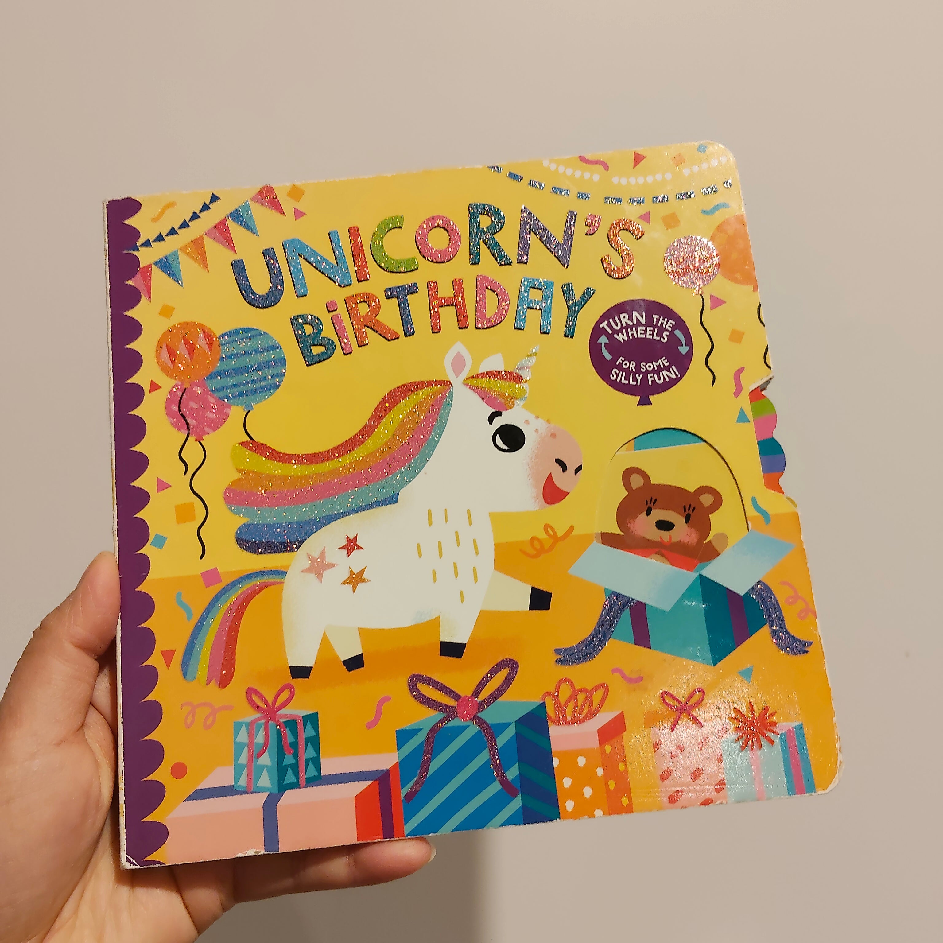 "Unicorn's Birthday: Turn the Wheels for Some Silly Fun!" written by Lucy Golden BOARDBOOK