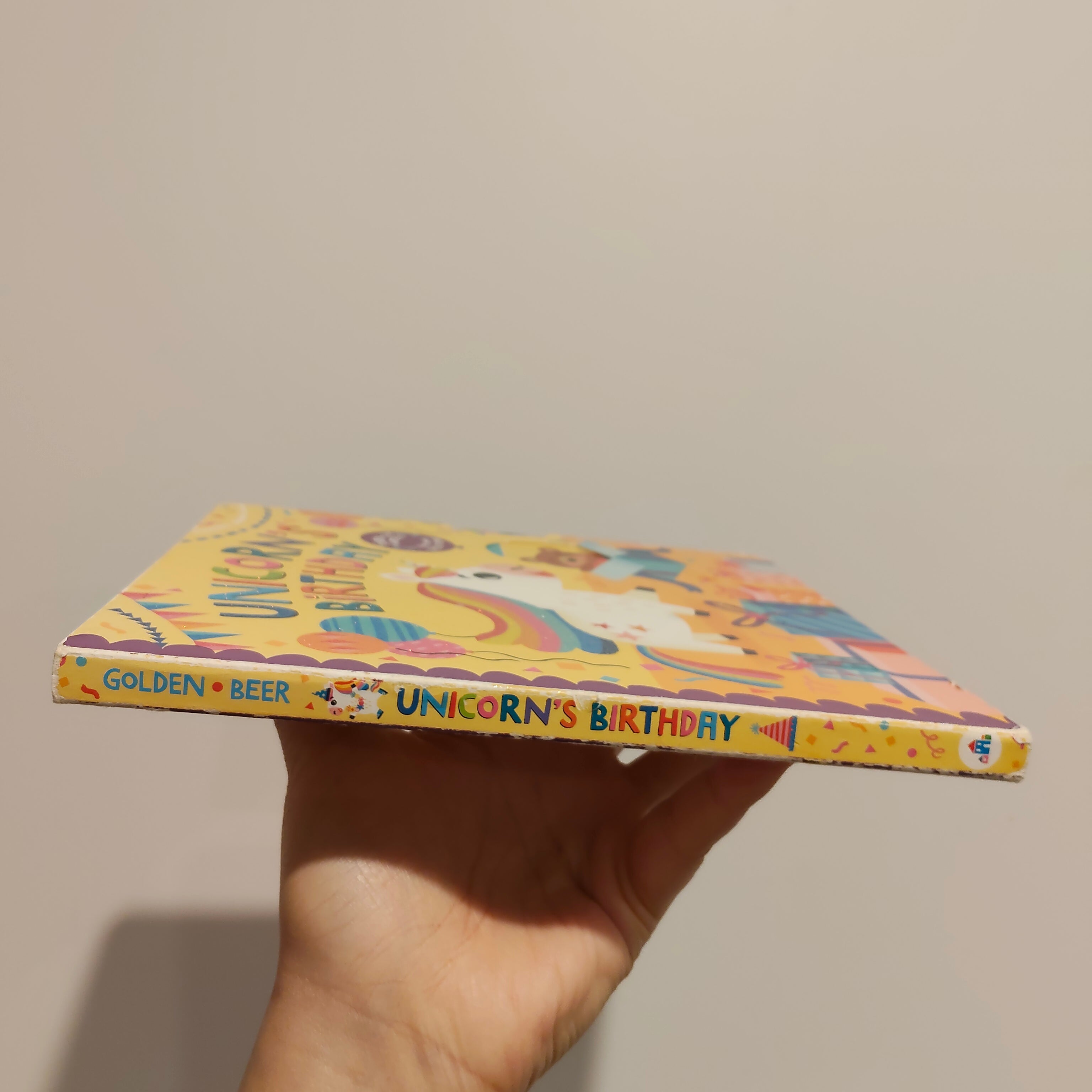 "Unicorn's Birthday: Turn the Wheels for Some Silly Fun!" written by Lucy Golden BOARDBOOK