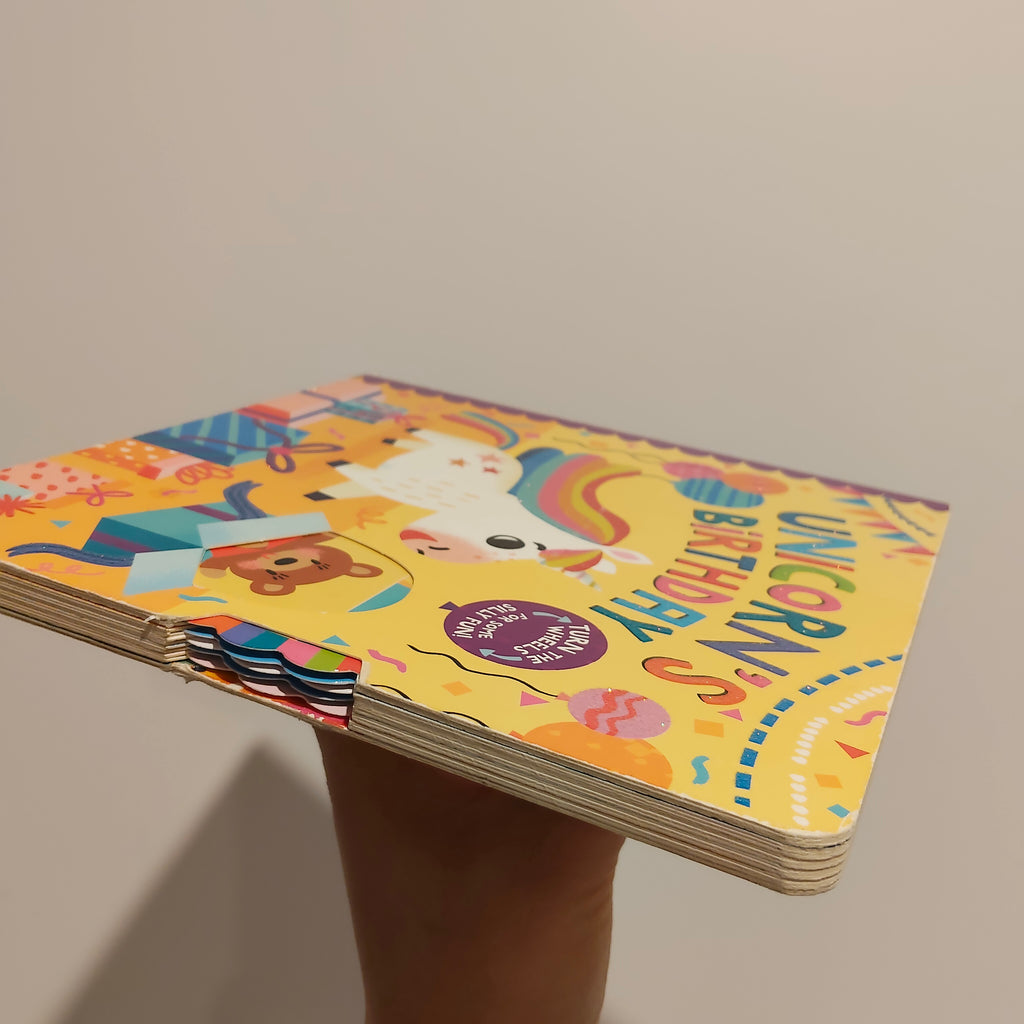 "Unicorn's Birthday: Turn the Wheels for Some Silly Fun!" written by Lucy Golden BOARDBOOK