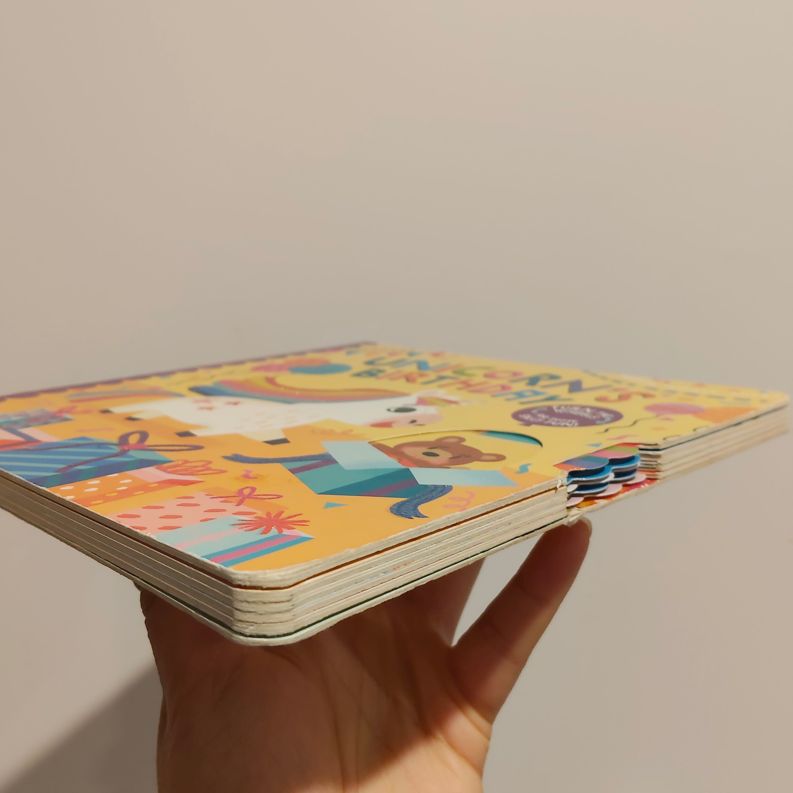 "Unicorn's Birthday: Turn the Wheels for Some Silly Fun!" written by Lucy Golden BOARDBOOK