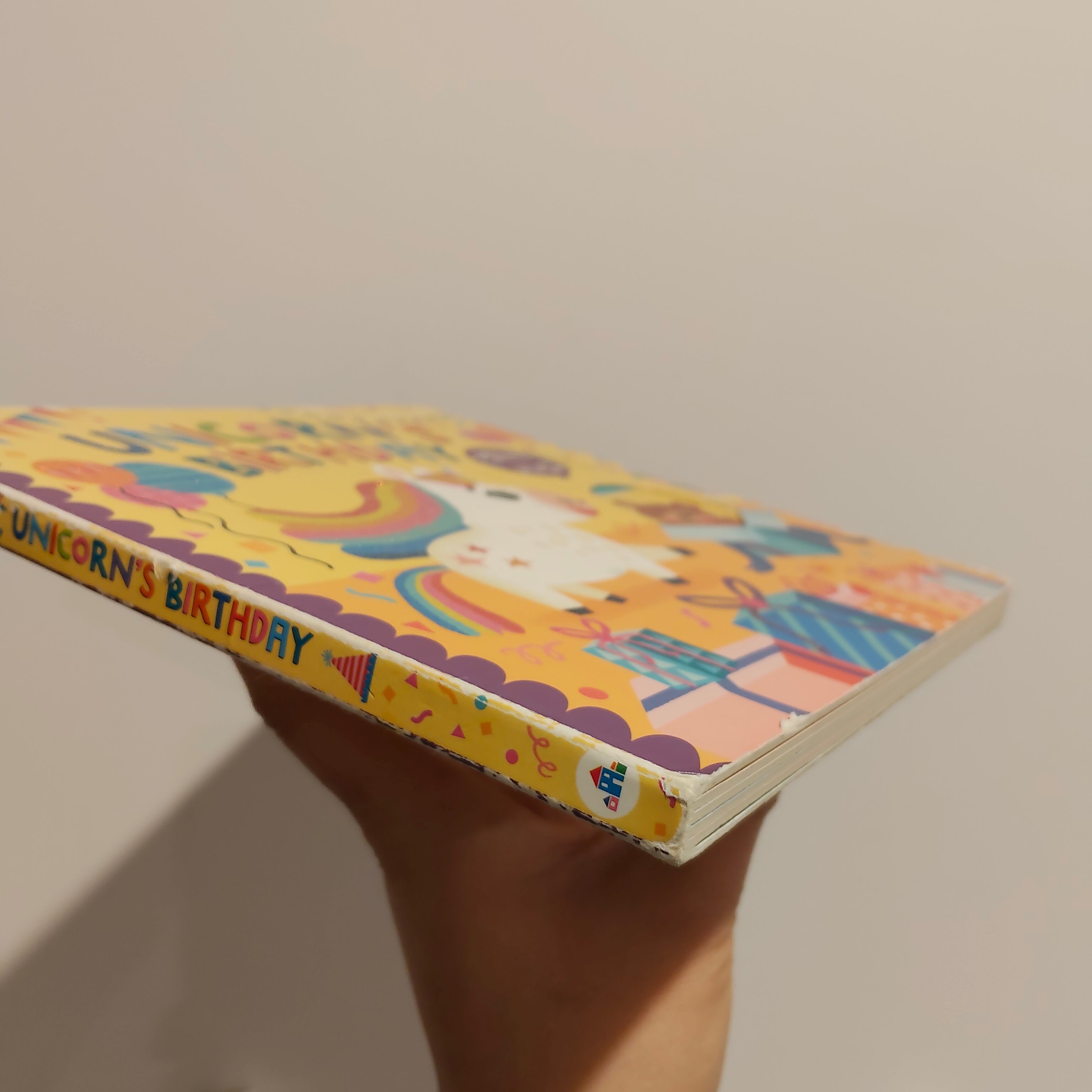 "Unicorn's Birthday: Turn the Wheels for Some Silly Fun!" written by Lucy Golden BOARDBOOK
