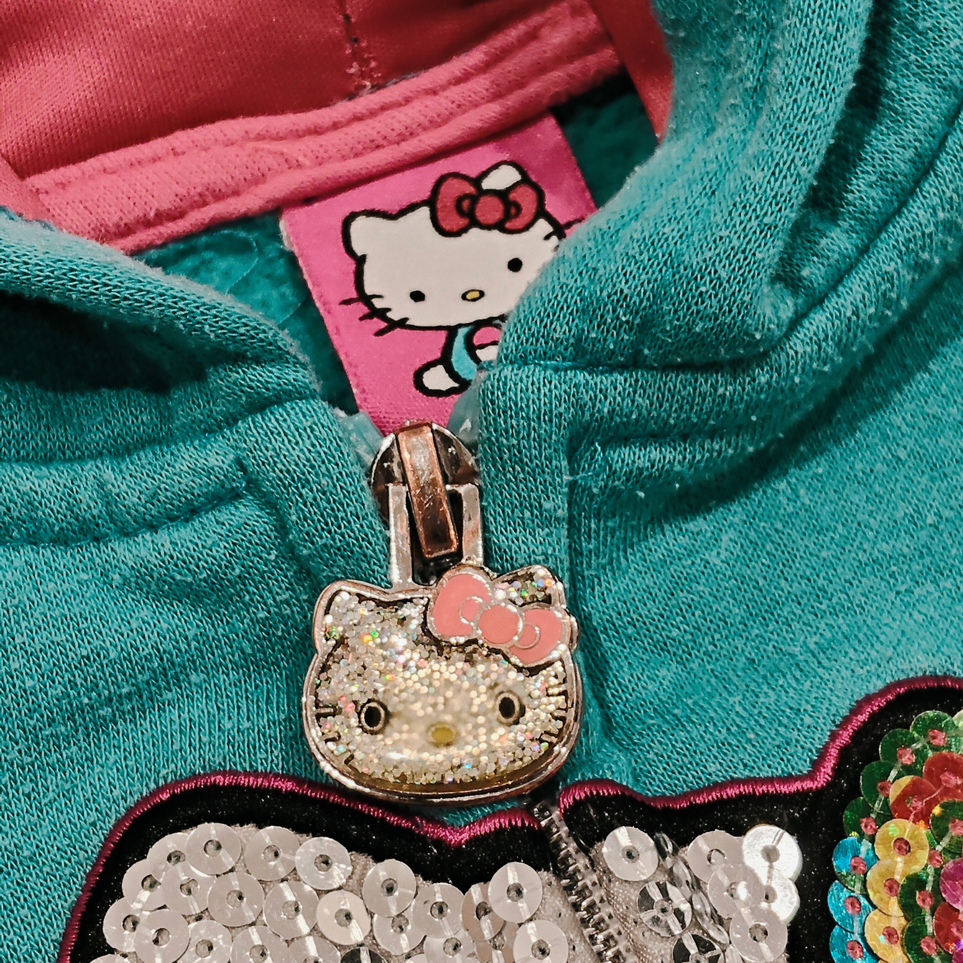 HELLO KITTY hoodie size 5 Girls (sequin-embellished graphic)
