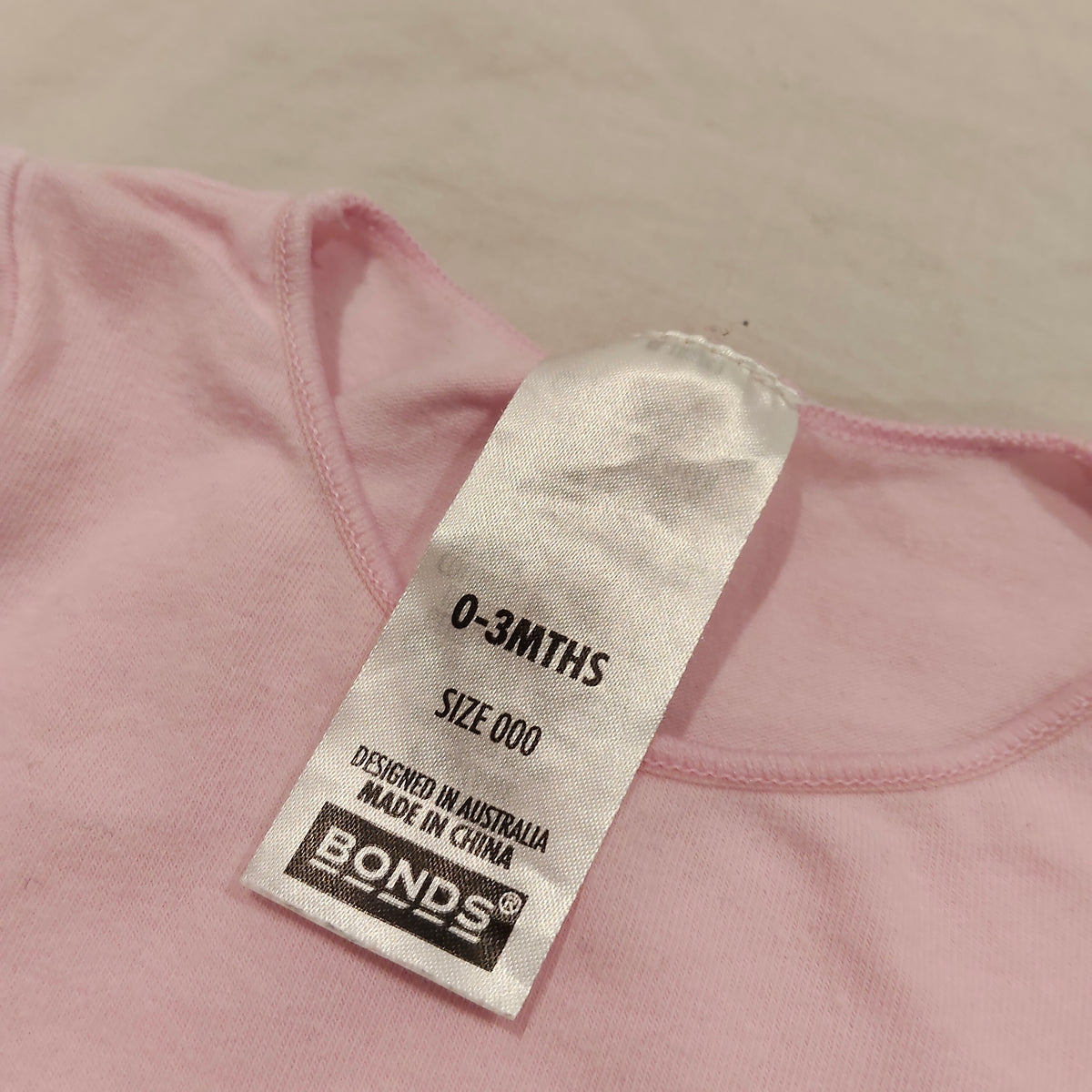 BONDS Bodysuit Light Pink Size 0-3M Baby Short Sleeve