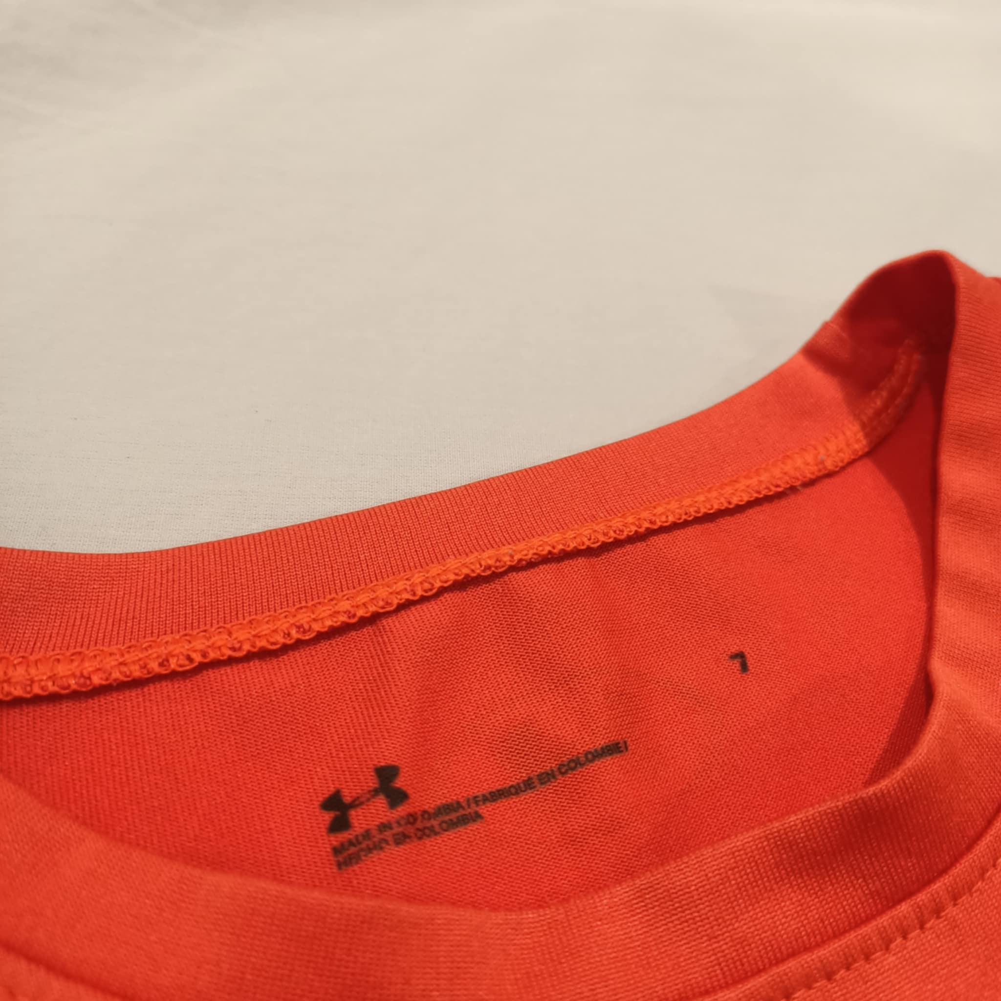 UNDER AMOUR tee size 7 boys short sleeve orange